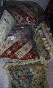 A collection of five needlepoint scatter cushions,