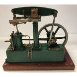 A Stuart Turner stationary live steam beam engine with single fly wheel, green painted,