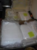 Two boxes of assorted vintage table and bed linens to include pillow cases,