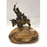 A Franz Bergmann cold cast painted bronze figure of an Arab with donkey being ridden by a monkey,