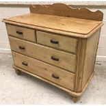 A Victorian pine chest of two short over two long drawers on turned supports,