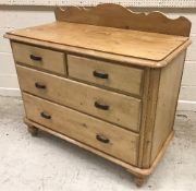 A Victorian pine chest of two short over two long drawers on turned supports,