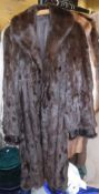 A full length brown mink coat,