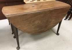 A George II mahogany dining table,