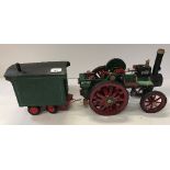 Two scratch built wooden and metal embellished 10-ton traction engines, models, one with driver,