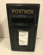 A modern black post box,