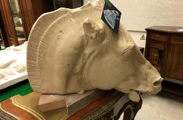 A life-size plaster model Paris horse head in the Romanesque manner
