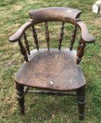 A 19th Century oak smoker's bow chair