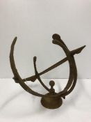 A modern iron armillary sphere sundial 46 cm high