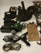 Two boxes containing various vintage oil cans, tins, etc, together with a Rudge No.