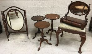 A Victorian mahogany oval toilet mirror on two drawer base,