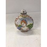 A Chinese enamel moon flask shaped snuff bottle decorate in the European manner with an elegant