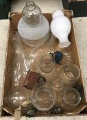 A box containing various oil lamp shades and a box containing an oil lamp and various glass and