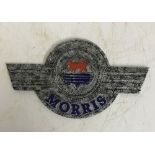 A modern painted cast metal sign "Morris",