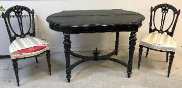 A Victorian ebonised and brass inlaid centre table, the top with centre medallion,