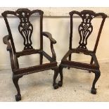 A set of eight 20th Century Chippendale style dining chairs with carved backs and drop-in seats (6