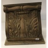A carved oak wall shelf with acanthus leaf decoration and marble top,