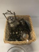 A basket of various plated wares to include fruit basket, fruit bowl, spirit kettle, etc.