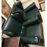 A pair of modern upholstered wing back scroll arm chairs in the circa 1900 style