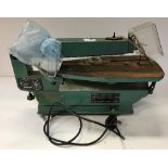 A Titan SF8R bench top band saw,