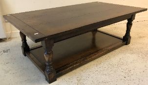 A modern oak coffee table in the 18th Century manner,