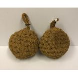 A pair of 12" coir ball fenders