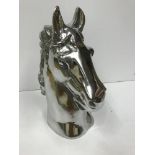 A polished aluminium horse head ornament 45cm high