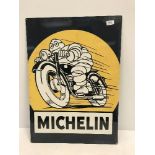 A reproduction rectangular metal sign, "Michelin", with Michelin Man on a motorbike,