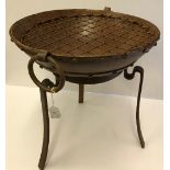 A modern cast iron fire pit on stand, 41.