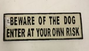 A modern painted cast iron sign inscribed "Beware of the Dog...", approx 35.