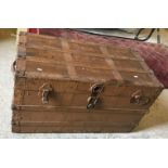 A painted tin and canvas trunk,