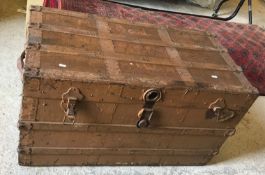 A painted tin and canvas trunk,