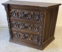 A mid 20th Century walnut bureau of three long drawers on cabriole legs to claw and ball feet, 75.