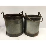 Two large galvanised and studded steel swing handled buckets largest 35 cm high