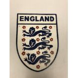 A modern painted cast iron sign inscribed "England",
