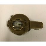 A modern reproduction brass marching compass