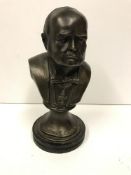 A modern bronzed bust of Winston Churchill,