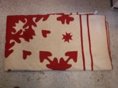 A vintage American quilt of red and cream design CONDITION REPORTS Is backed with