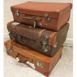 Three various leather suitcases