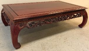 A modern Chinese cherry wood coffee table,