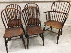 A 19th Century ash stick back Windsor type elbow chair on turned legs united by an H stretcher,