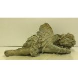 A modern cast iron figure of a fairy sleeping, approx 40 cm long,