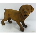 A modern cast iron Puppy with rust effect finish,