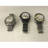 Two Breitling-style wristwatches and a Tag-style wristwatch