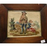 A Victorian needlework panel depicting a couple with two dogs, housed in a rosewood veneered frame,