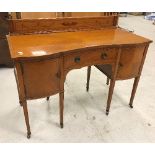 An Edwardian Sheraton Revival satinwood and inlaid sideboard with raised back over central drawer