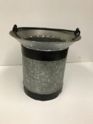 A small bucket with swing handle and bevelled lip, 33.