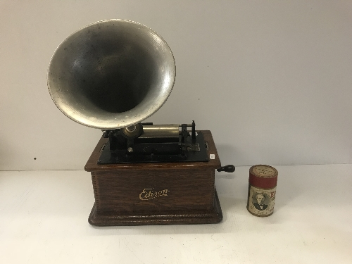 An Edison standard phonograph, oak cased, circa 1905 with aluminum horn,