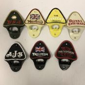 Seven modern painted cast metal motorbike wall mounted bottle openers including Royal Enfield, BSA,