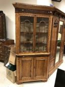 A 19th Century oak and mahogany inlaid free-standing corner cabinet,